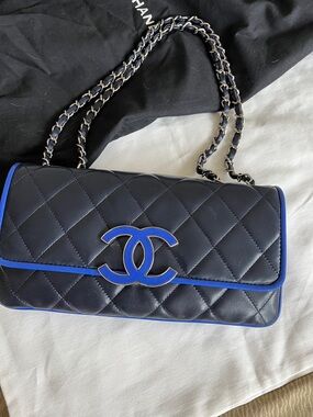 CHANEL Quilted Shoulder Bag in Black with Blue Trim